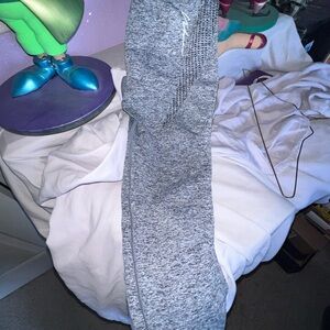 Grey speckled stretch pants.